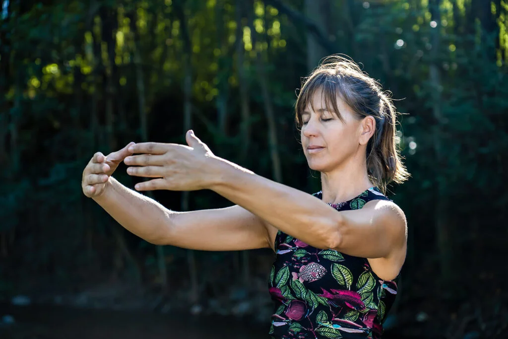 woman standing as a pole qigong